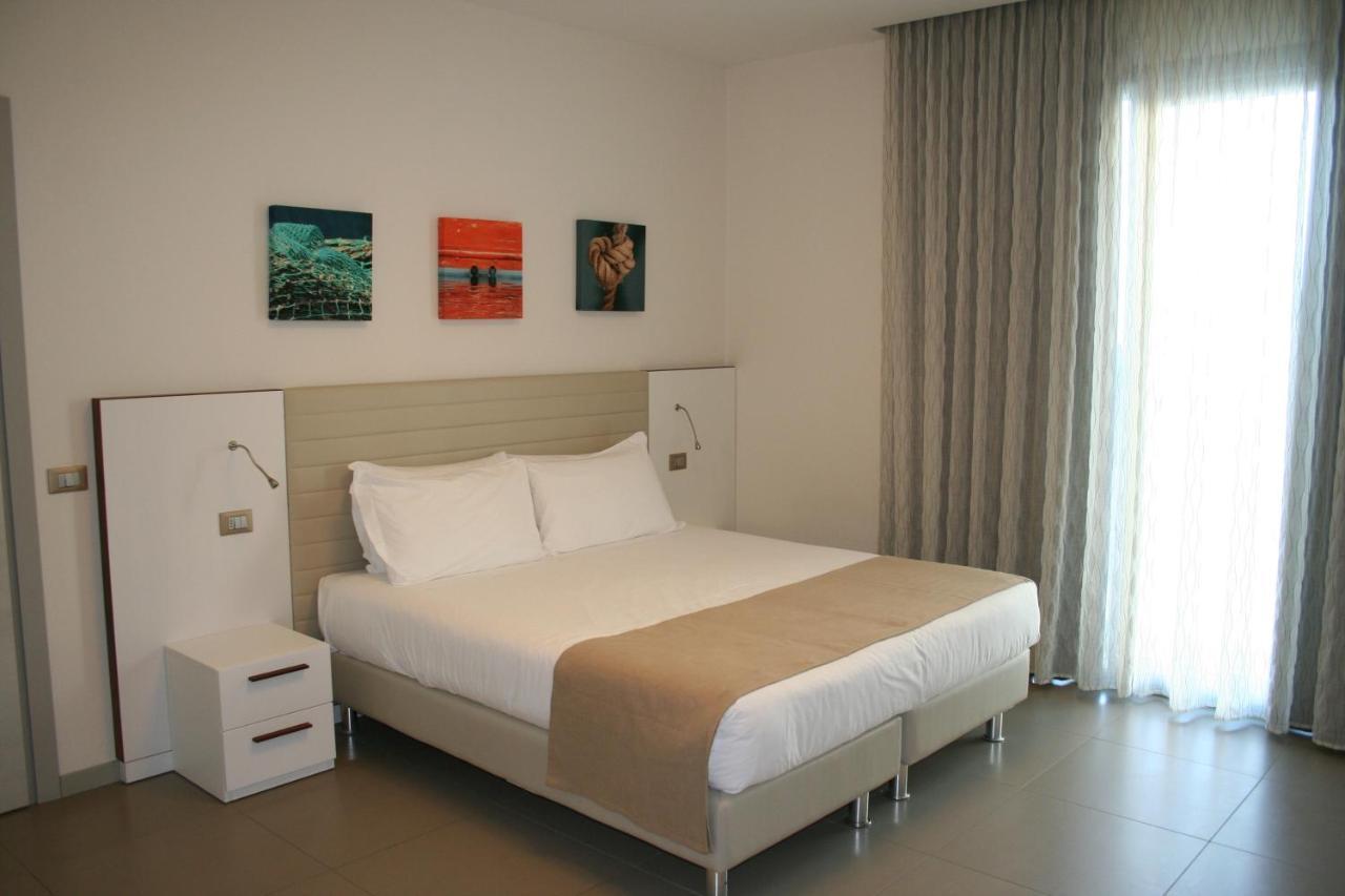 Hotel & Residence Cavalluccio Marino Ріміні Номер фото