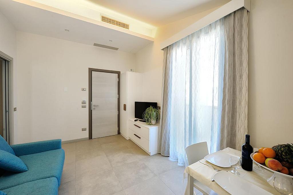 Hotel & Residence Cavalluccio Marino Ріміні Номер фото